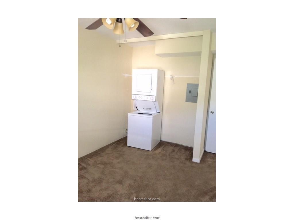 4400 Boyett Street, Unit A Bryan, TX 77801 - Photo 8 of 9 a open bathroom with a shower and a sink