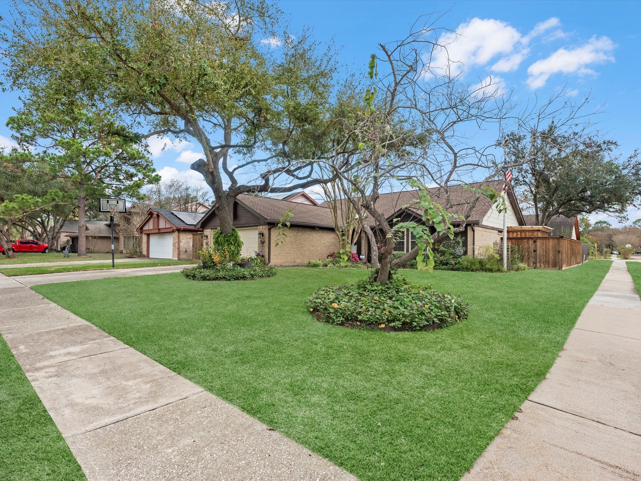 7735 Leafbrook Lane Spring, TX 77379 - Photo 3 of 27 a view of a house with a yard