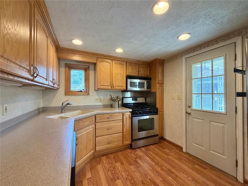 4289 Glen Lytle Road Pittsburgh, PA 15217 - Photo 11 of 46 Recessed lights in Kitchen and Vinyl Flooring.