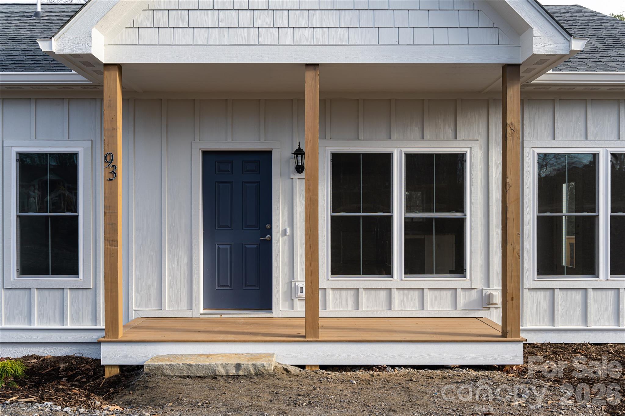93 Locust Grove Road Weaverville, NC 28787 - Photo 2 of 26 a view of a house with a window and wooden floor