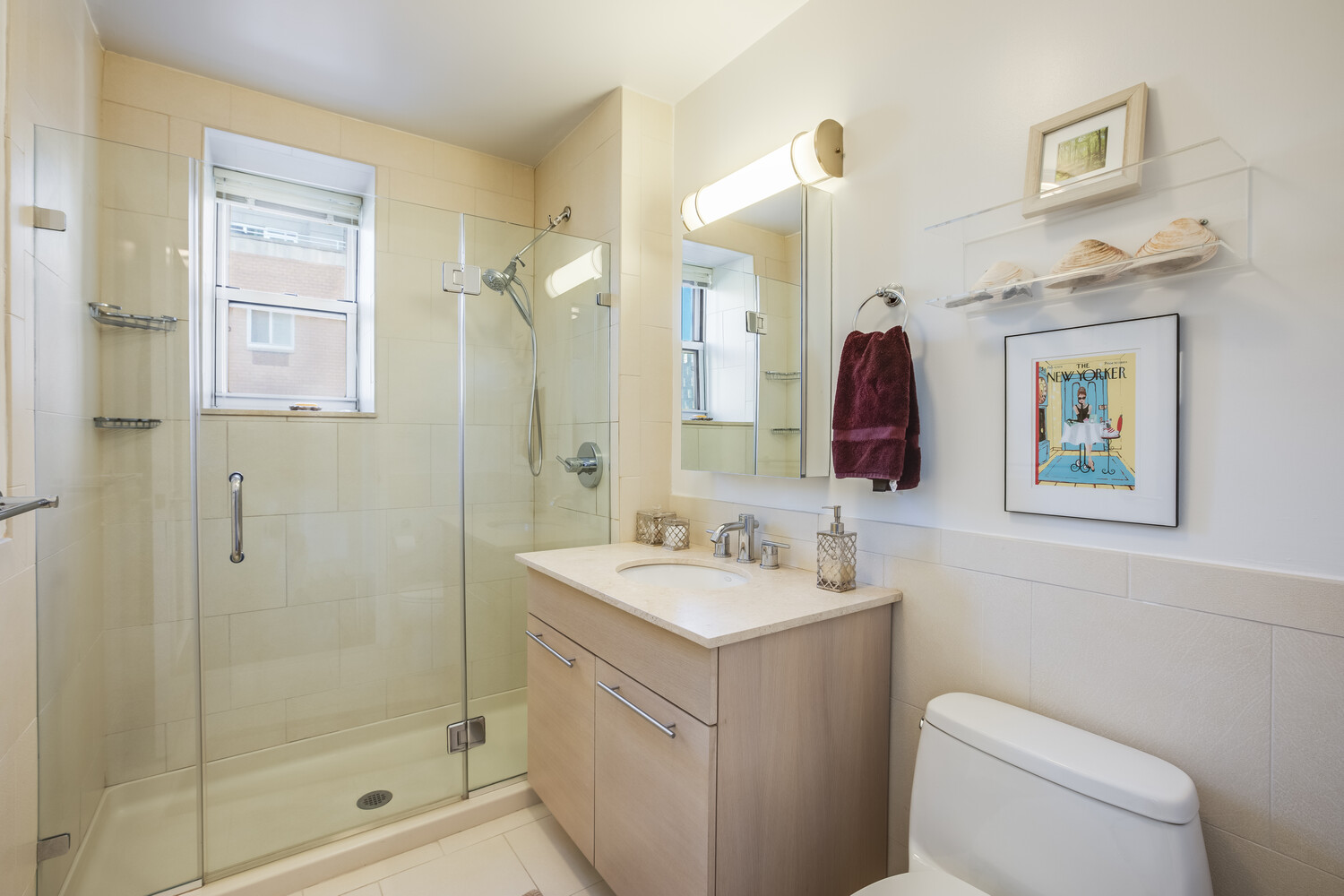 2279 3rd Avenue, Unit 4A Manhattan, NY 10035 - Photo 4 of 8 a bathroom with a sink a toilet and shower