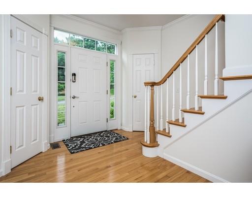 34 Tannery Road Sturbridge, MA 01518 - Photo 17 of 33 a view of entryway and hall with wooden floor