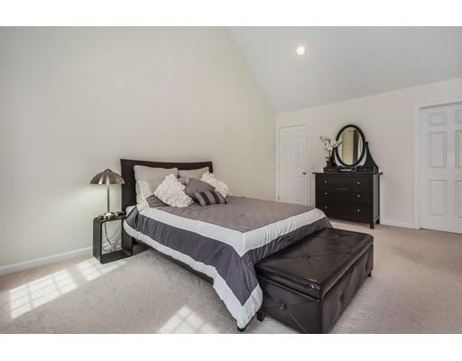34 Tannery Road Sturbridge, MA 01518 - Photo 20 of 33 a bedroom with a bed and cabinets