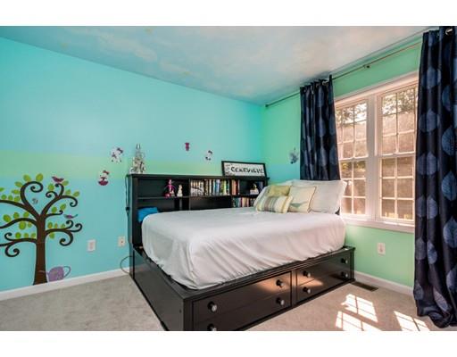 34 Tannery Road Sturbridge, MA 01518 - Photo 26 of 33 a bed sitting in a bedroom next to a window