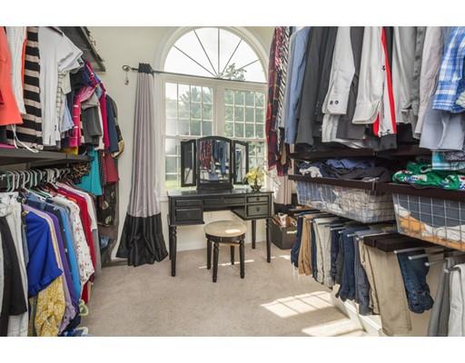 34 Tannery Road Sturbridge, MA 01518 - Photo 28 of 33 a view of walk in closet with clothes and shoes