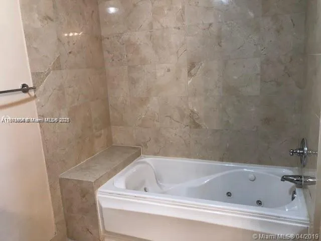 a bathroom with a bathtub