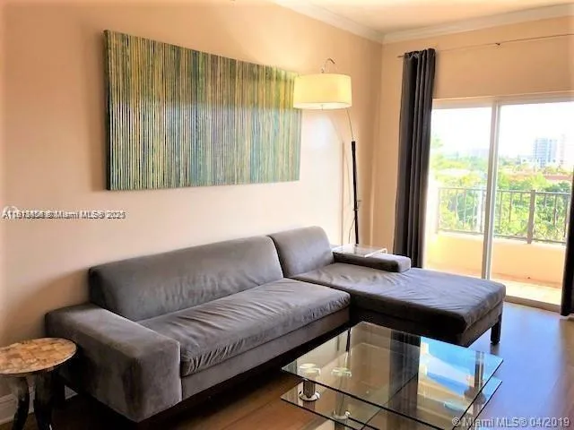 a living room with a couch and a table