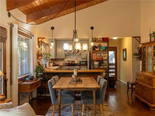 a kitchen with a sink a stove and a window