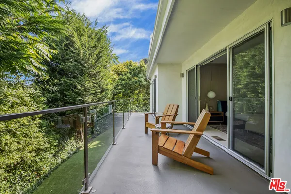 a view of outdoor space deck and mountain view