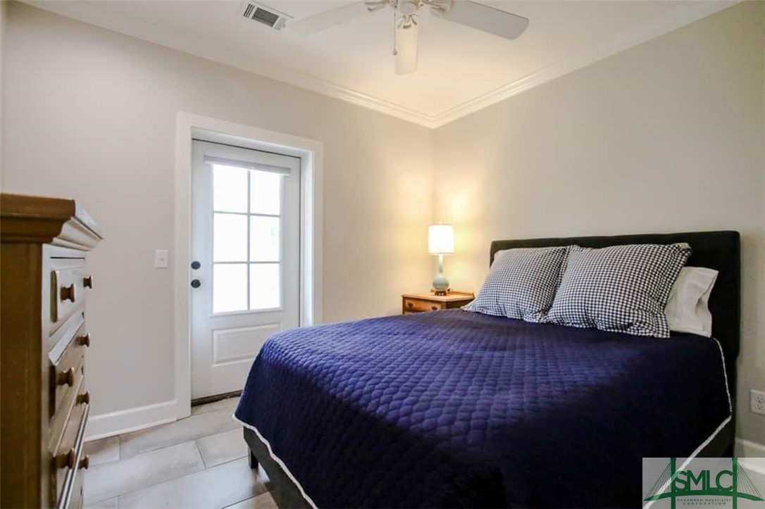 560 Tivoli Trail Road Richmond Hill, GA 31324 - Photo 38 of 48 Bedroom with access to back porch