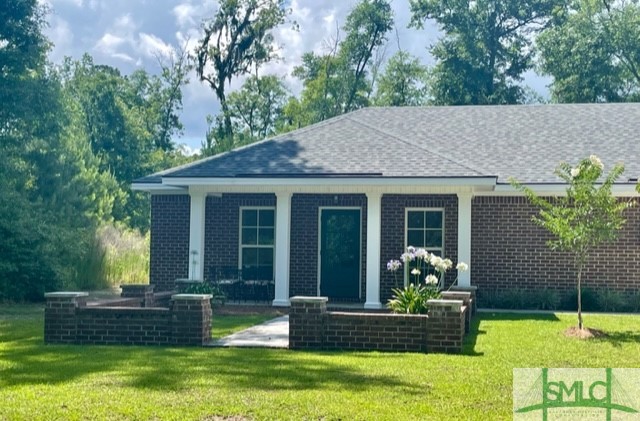 560 Tivoli Trail Road Richmond Hill, GA 31324 - Photo 48 of 48 Landscaped courtyard