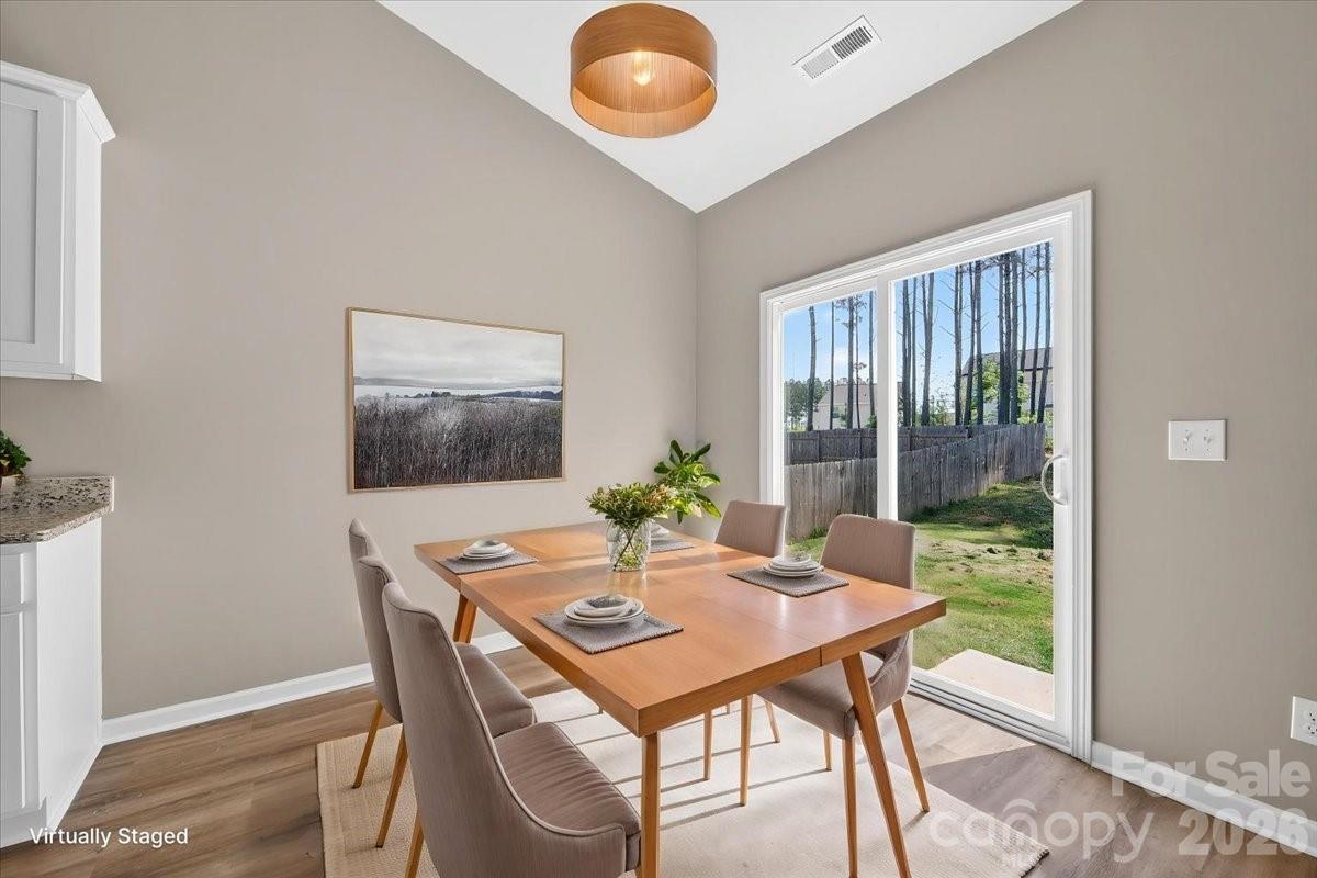4322 One Mile Way Charlotte, NC 28215 - Photo 21 of 48 a view of a dining room with furniture and window
