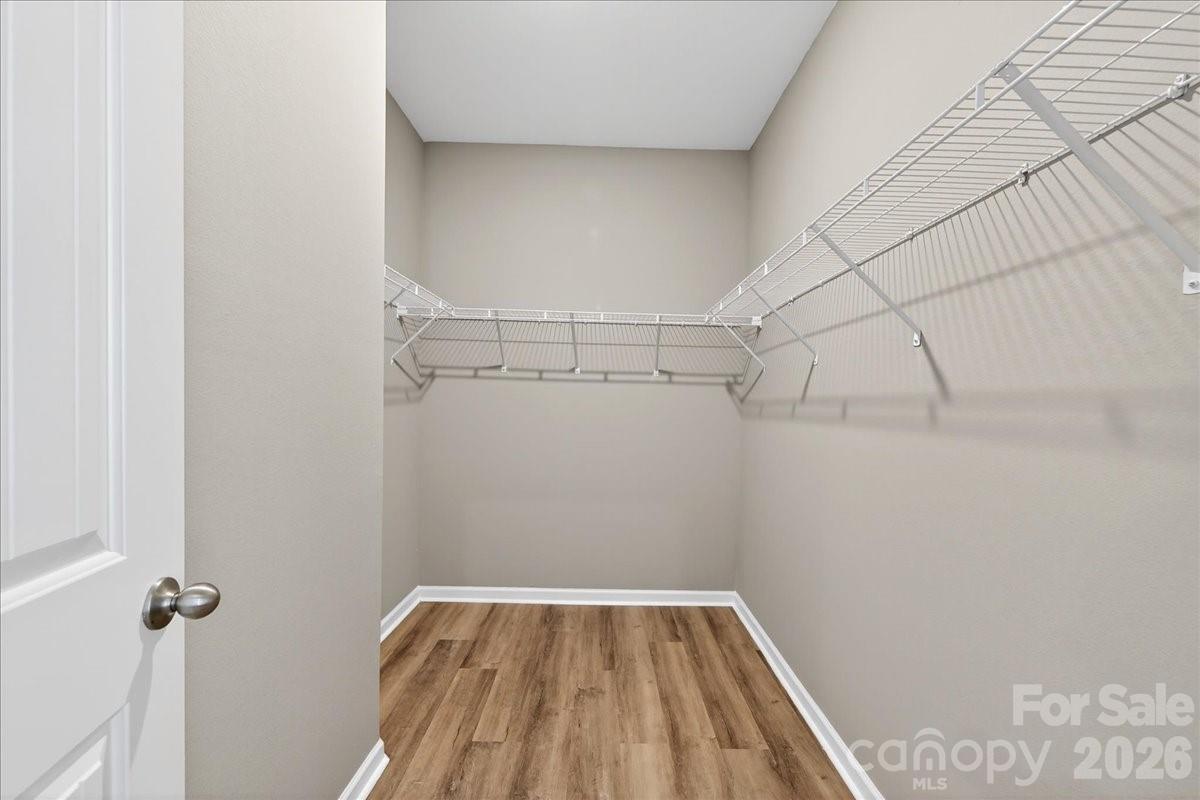 4322 One Mile Way Charlotte, NC 28215 - Photo 32 of 48 a view of a room with racks on the wall