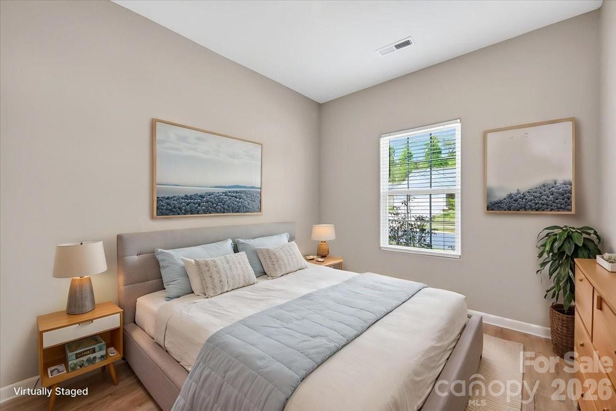 4322 One Mile Way Charlotte, NC 28215 - Photo 33 of 48 a bedroom with a bed and a window