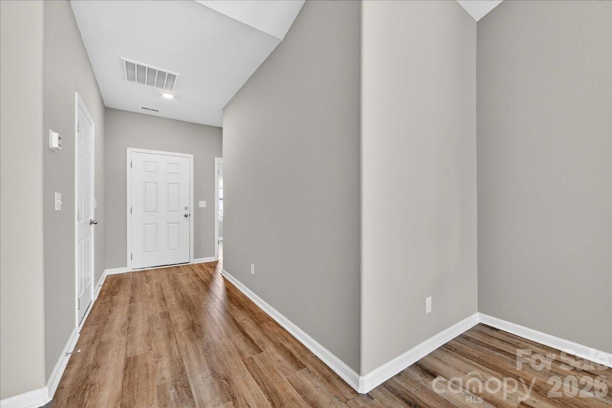 4322 One Mile Way Charlotte, NC 28215 - Photo 6 of 48 a view of a room with wooden floor