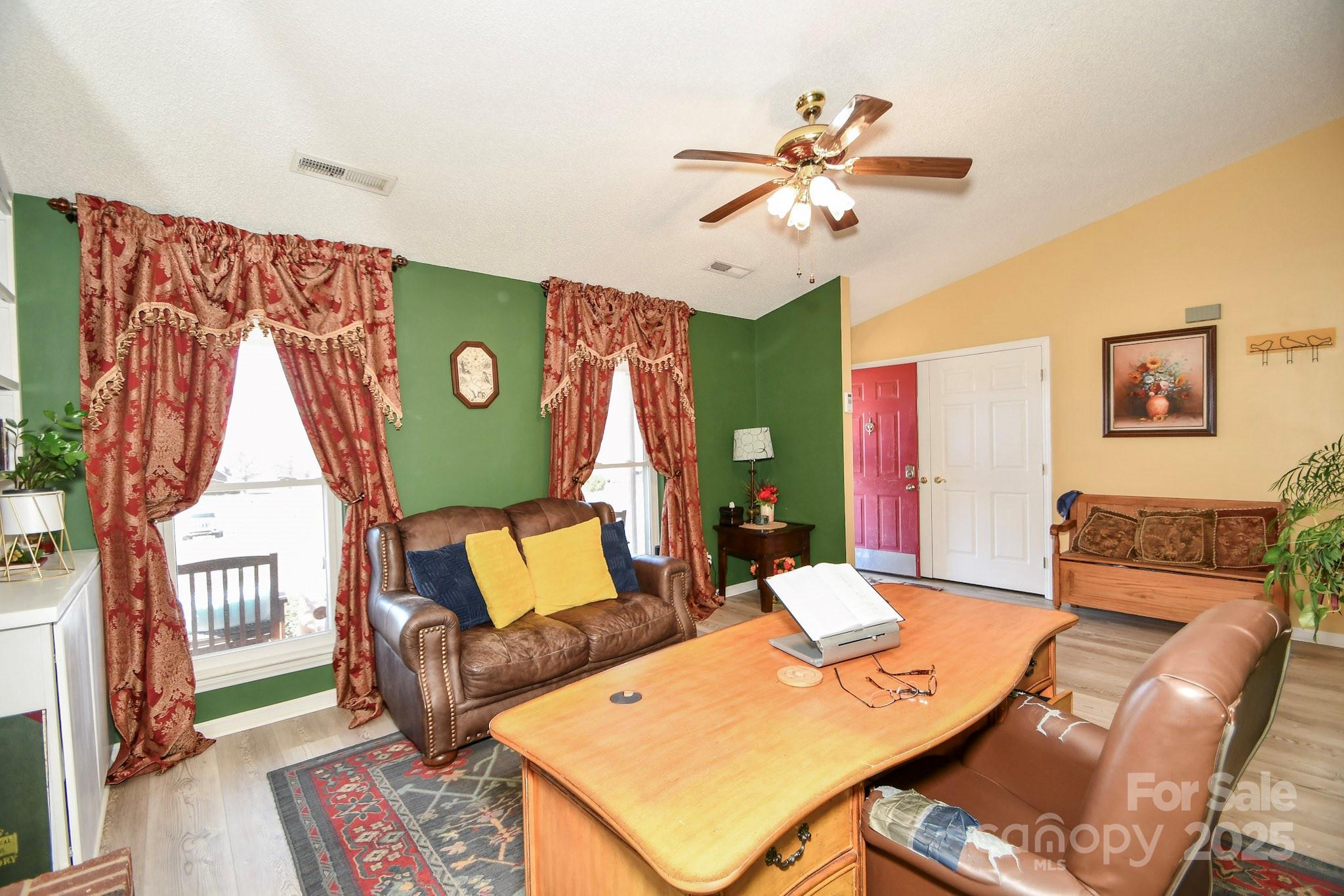 3731 Maple Knoll Drive Monroe, NC 28112 - Photo 12 of 40 a view of a dining room with furniture wooden floor and a chandelier