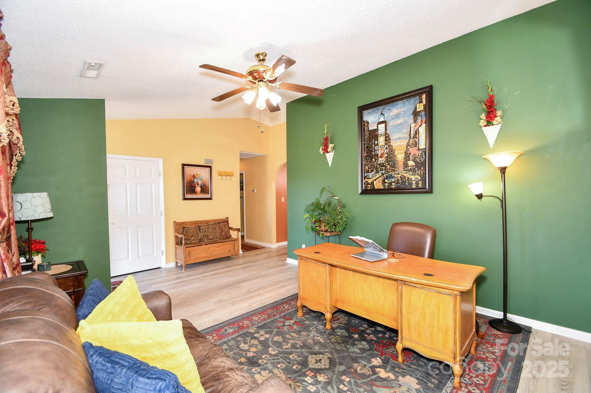 3731 Maple Knoll Drive Monroe, NC 28112 - Photo 13 of 40 a living room with furniture and wooden floor