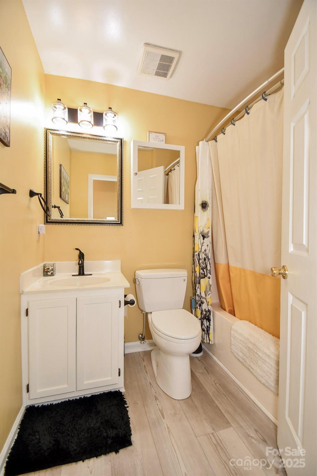 3731 Maple Knoll Drive Monroe, NC 28112 - Photo 23 of 40 a bathroom with a toilet a sink and a mirror