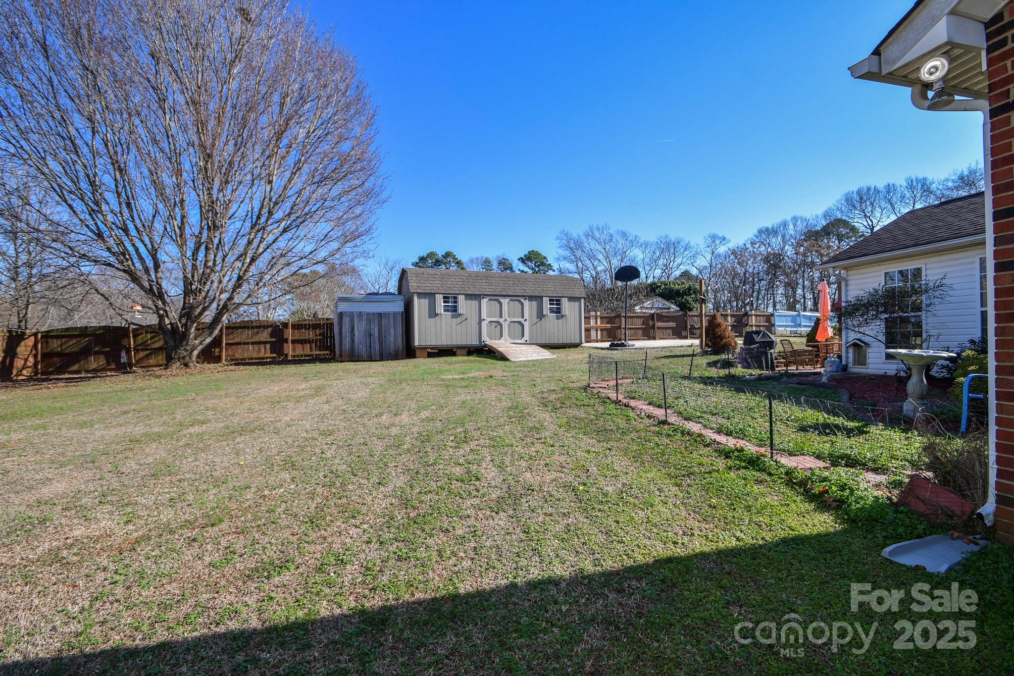 3731 Maple Knoll Drive Monroe, NC 28112 - Photo 30 of 40 a view of a house with a yard