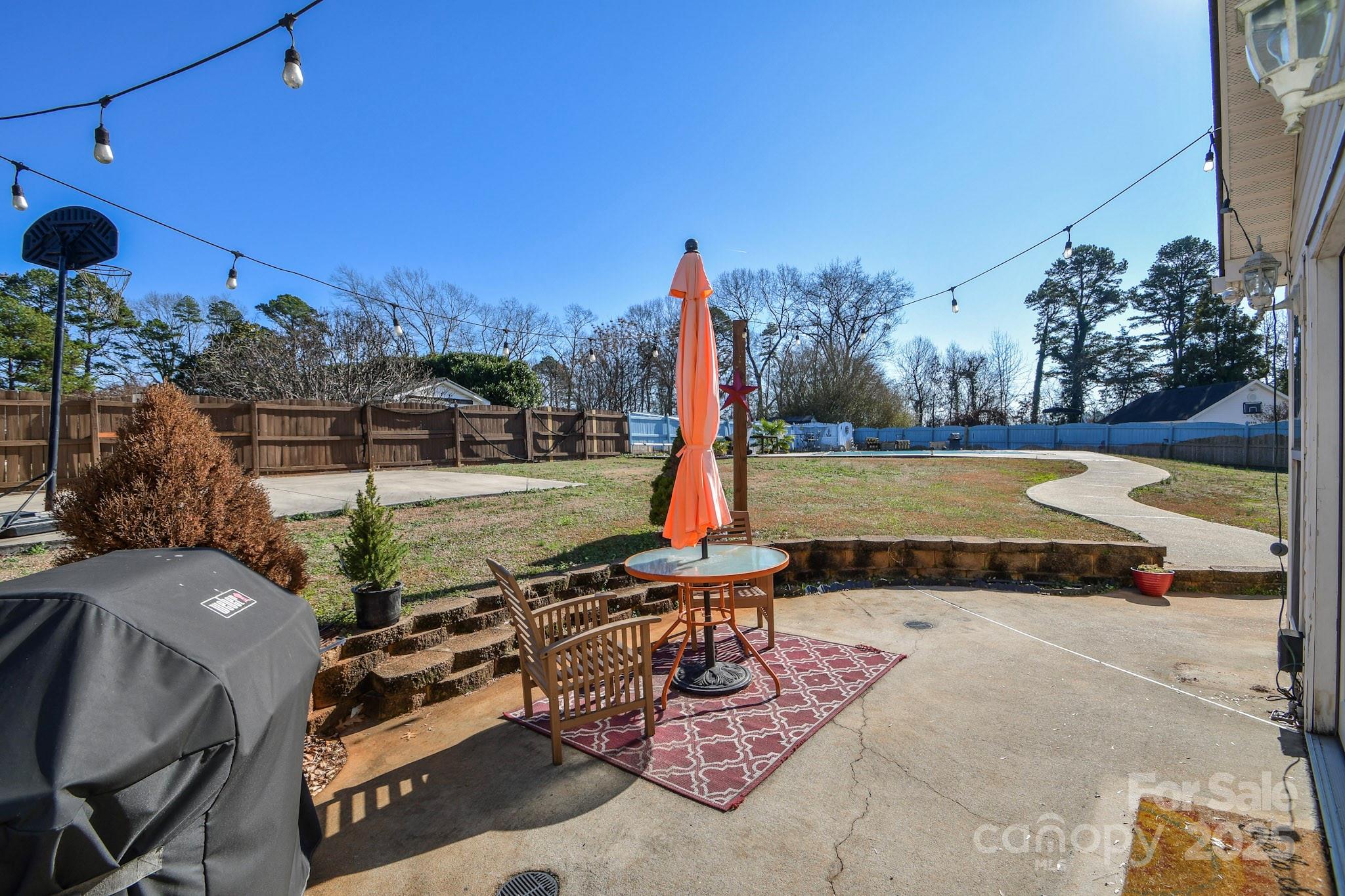 3731 Maple Knoll Drive Monroe, NC 28112 - Photo 32 of 40 a view of a backyard with swimming pool