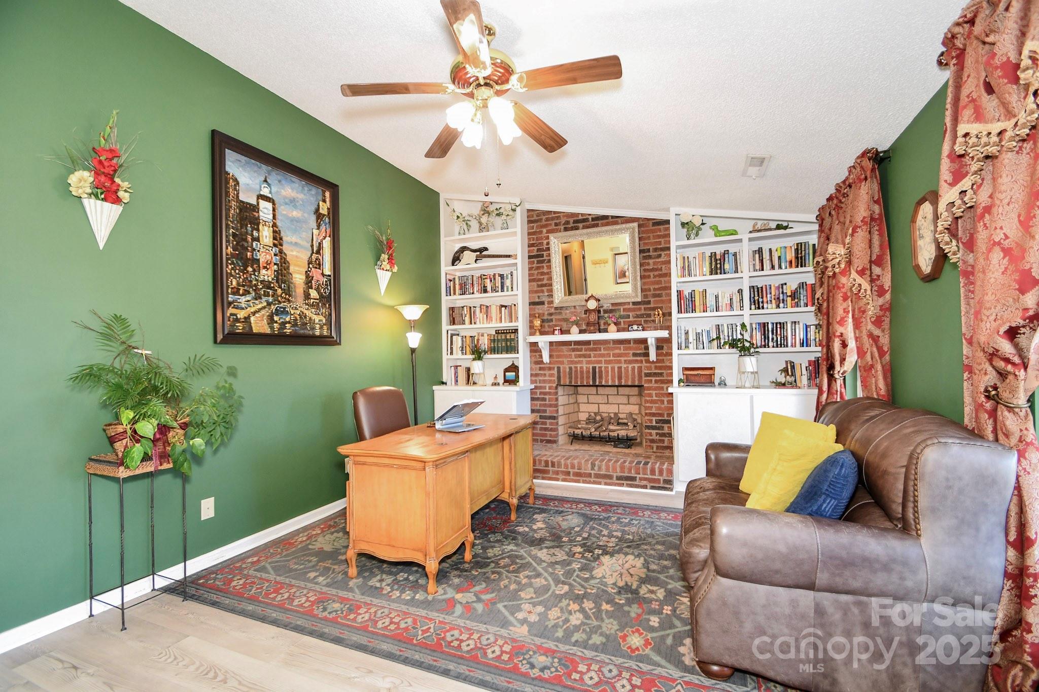 3731 Maple Knoll Drive Monroe, NC 28112 - Photo 10 of 40 a living room with furniture and a flat screen tv