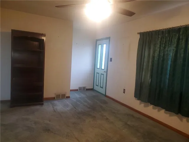 an empty room with windows