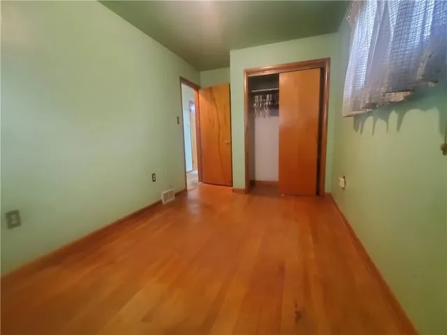 an empty room with closet