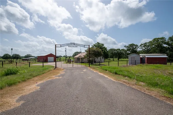 a view of a backyard with garden