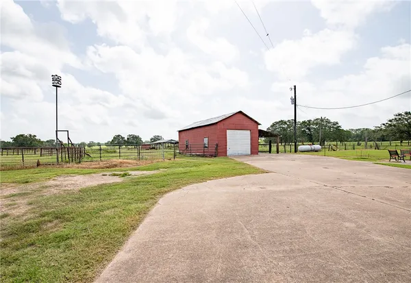 a view of a golf course with a lake view