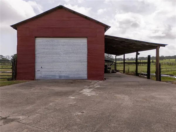 a front view of a house with a garage