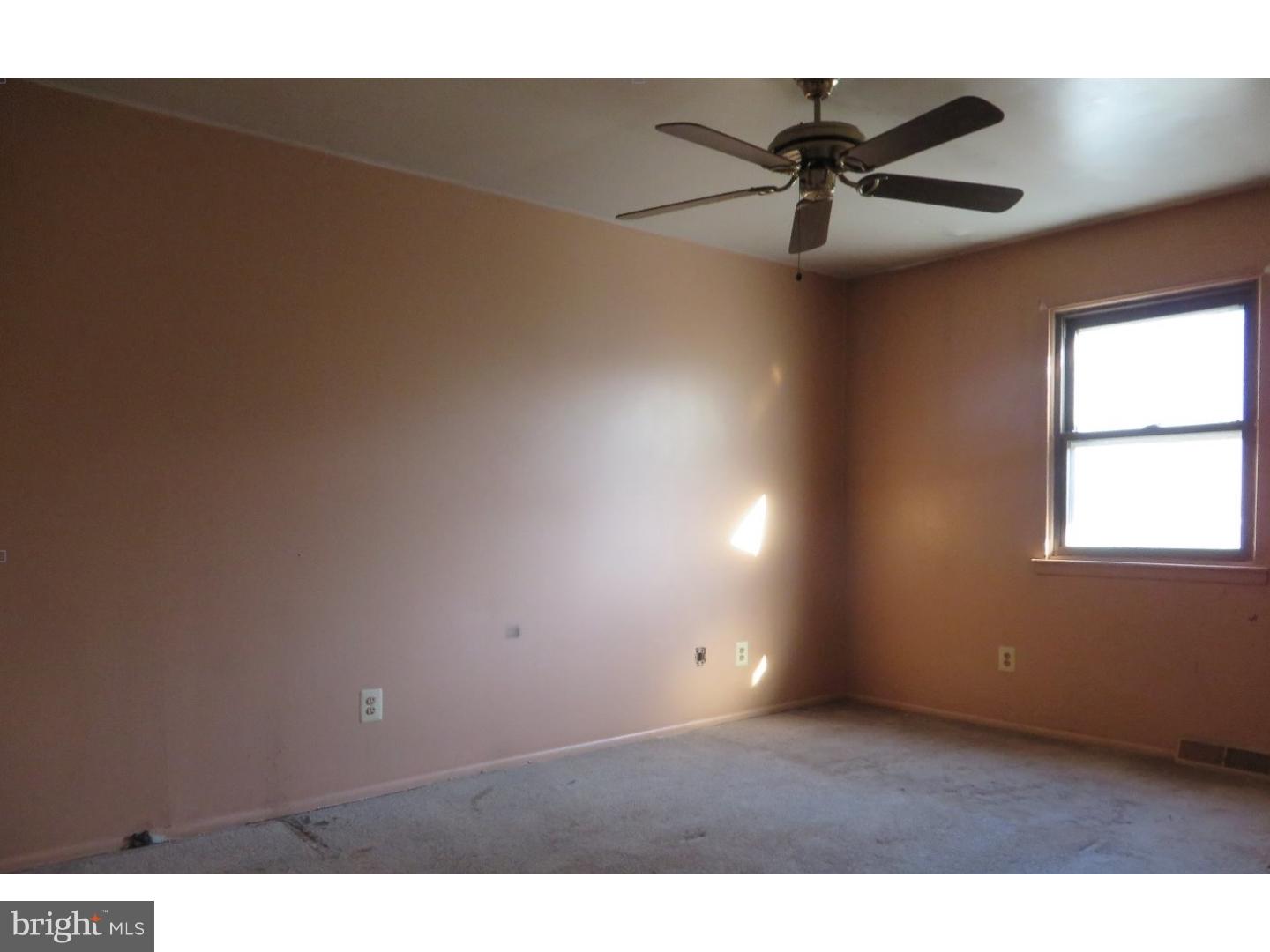 13010 Townsend Road, Unit L1 Philadelphia, PA 19154 - Photo 12 of 16 a view of an empty room and window