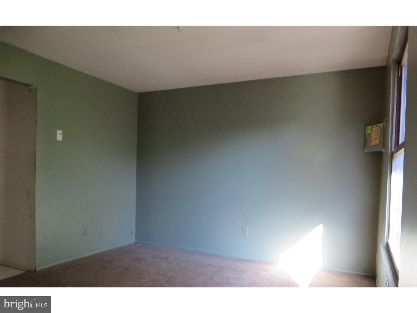 13010 Townsend Road, Unit L1 Philadelphia, PA 19154 - Photo 9 of 16 a view of an empty room and window
