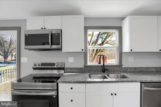 a view of a street with a ocean view