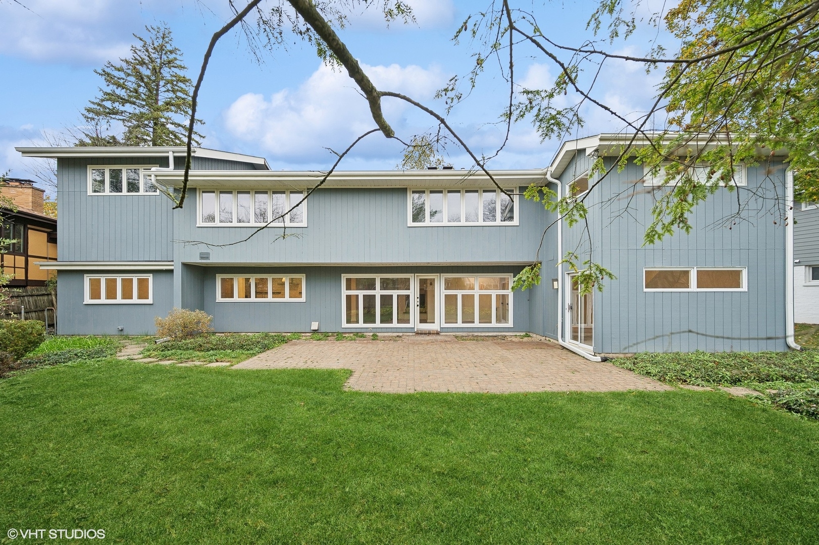 558 Sunset Lane Glencoe, IL 60022 - Photo 18 of 22 a view of a house with a yard