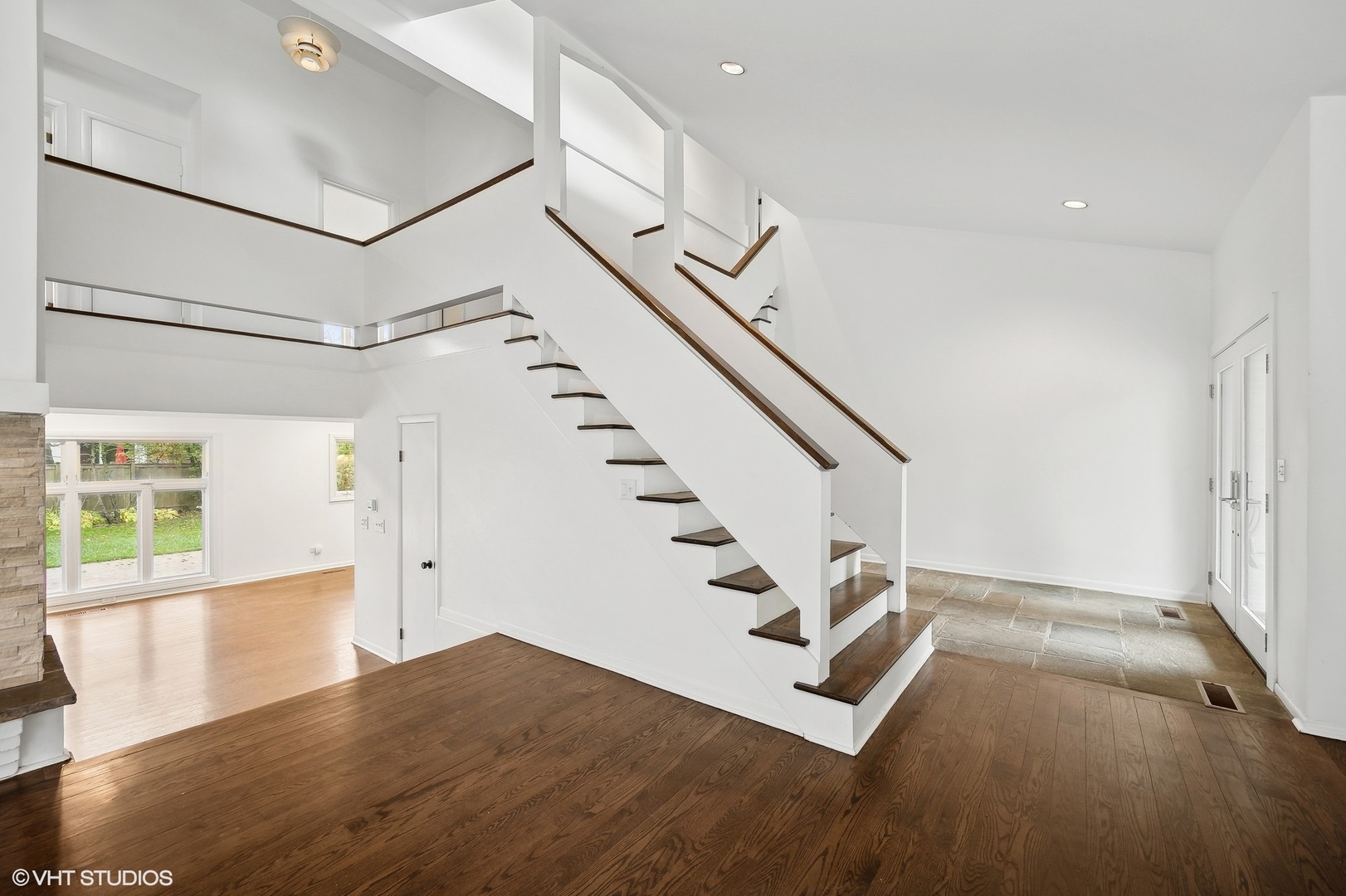 558 Sunset Lane Glencoe, IL 60022 - Photo 3 of 22 a view of entryway and hall with wooden floor