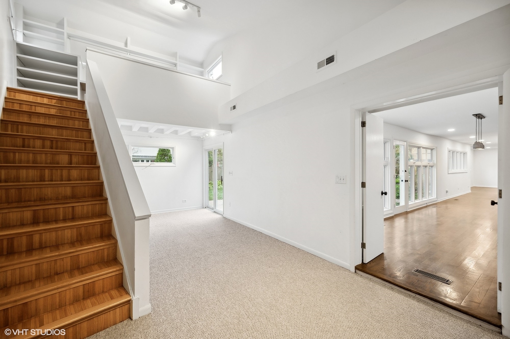 558 Sunset Lane Glencoe, IL 60022 - Photo 9 of 22 a view of entryway with wooden floor and stairs