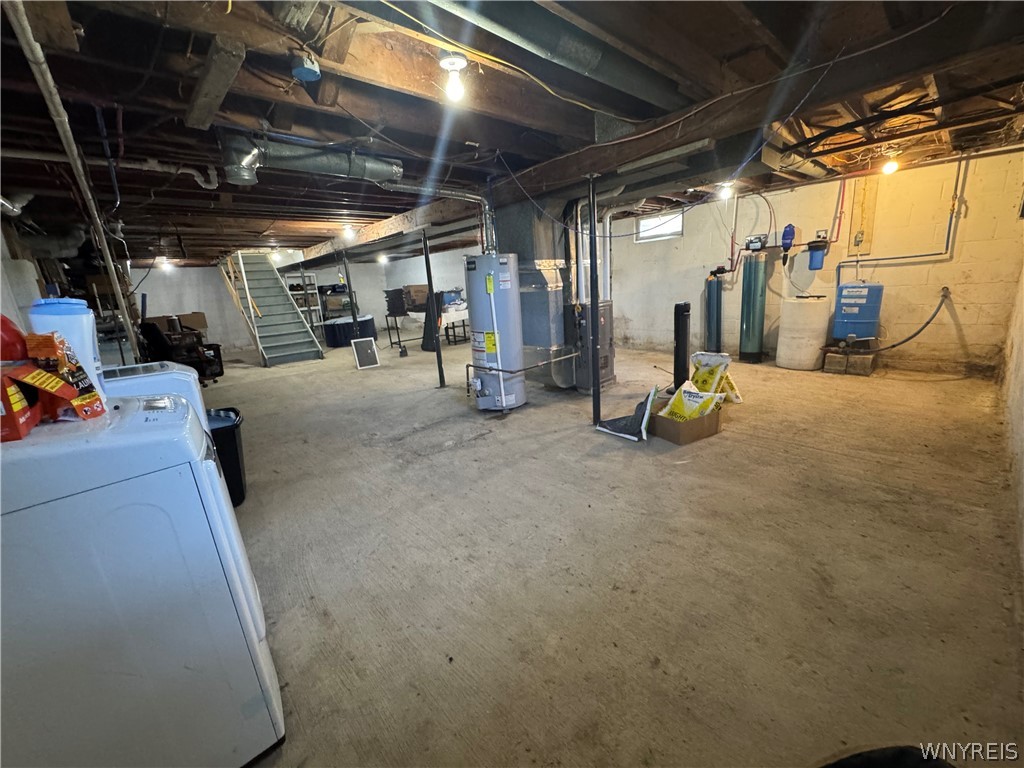 10180 Partridge Road Colden, NY 14080 - Photo 23 of 34 An unfinished lower level provides ample utility storage space alongside solid concrete floors.