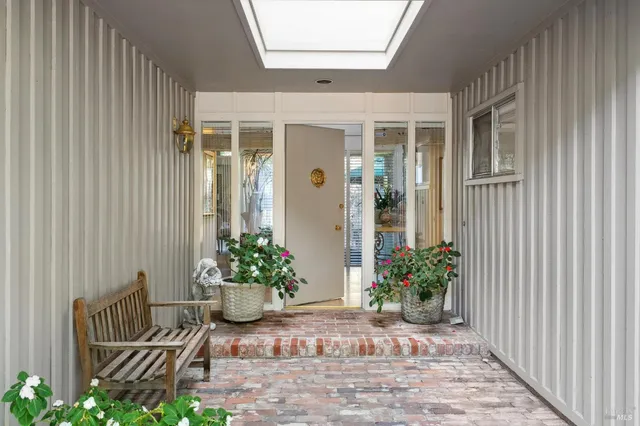 a view of a porch with chairs