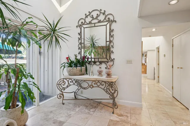 a view of a hallway with potted plant