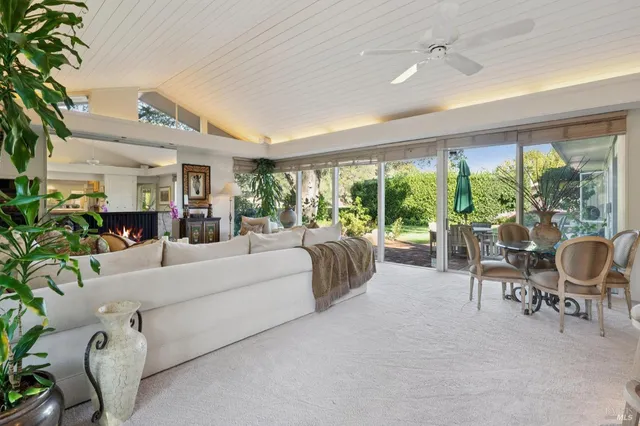 a kitchen with a table and chairs
