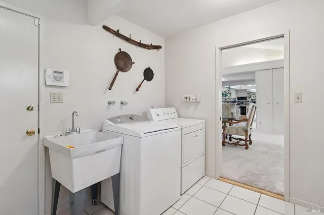 a view of house with backyard and outdoor seating