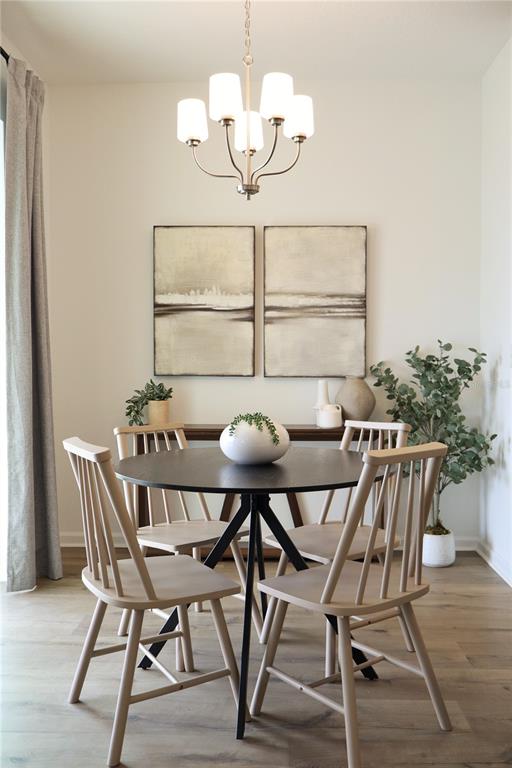 5719 Hiawassee Road Yalaha, FL 34797 - Photo 8 of 20 a view of a dining room that has a table and chairs in it