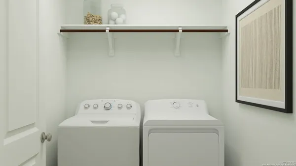 a utility room with dryer and washer