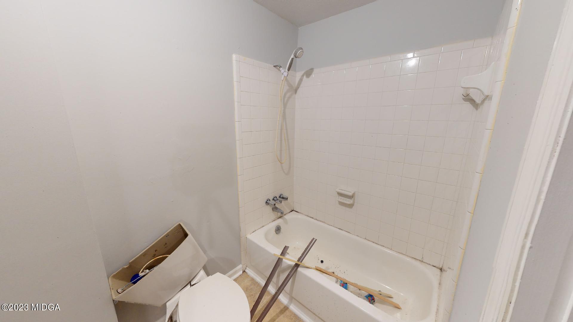 4521 Brookhaven Road Macon, GA 31206 - Photo 24 of 25 a bathroom with a sink and toilet