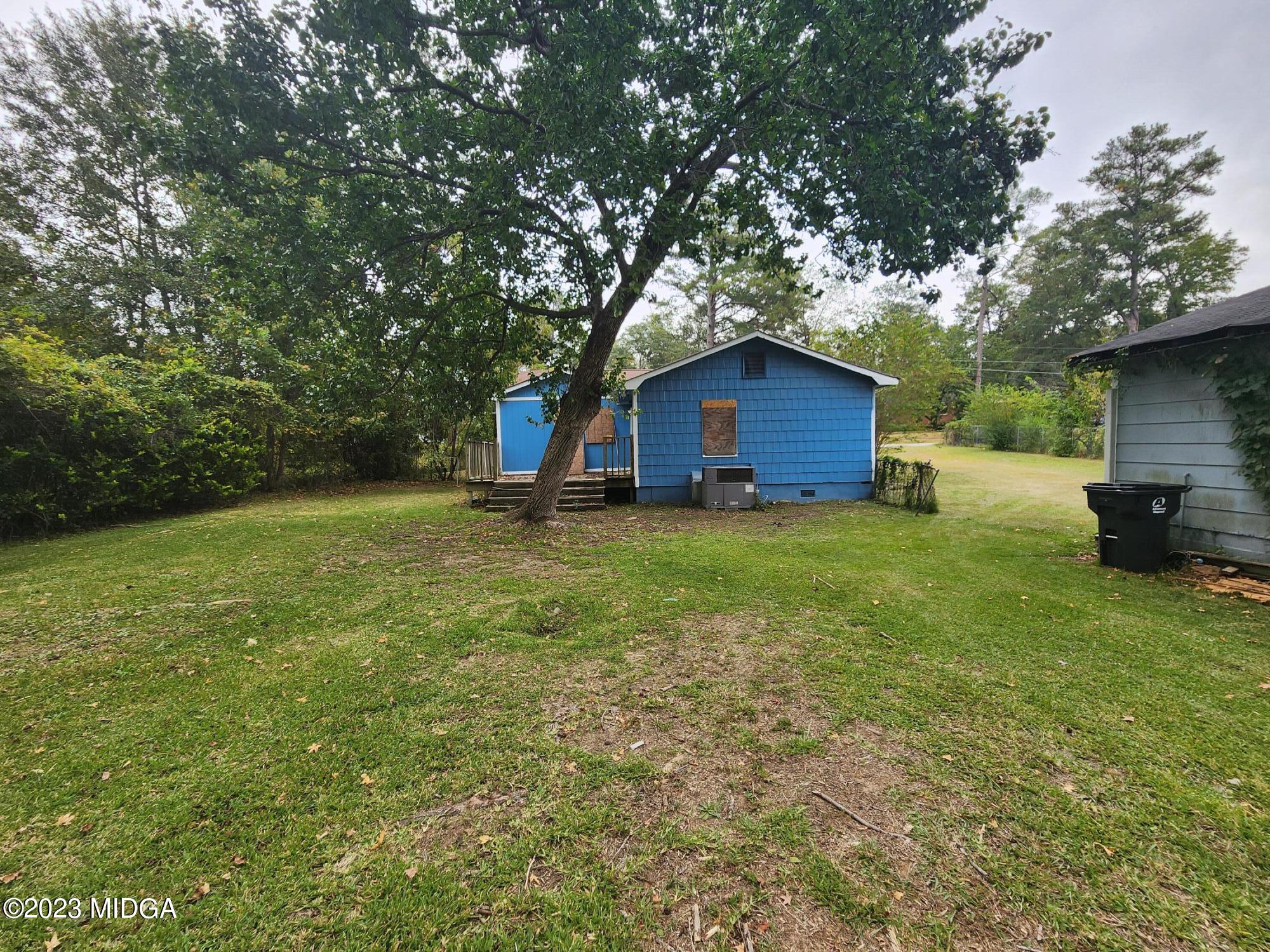 4521 Brookhaven Road Macon, GA 31206 - Photo 6 of 25 a view of a house with a yard