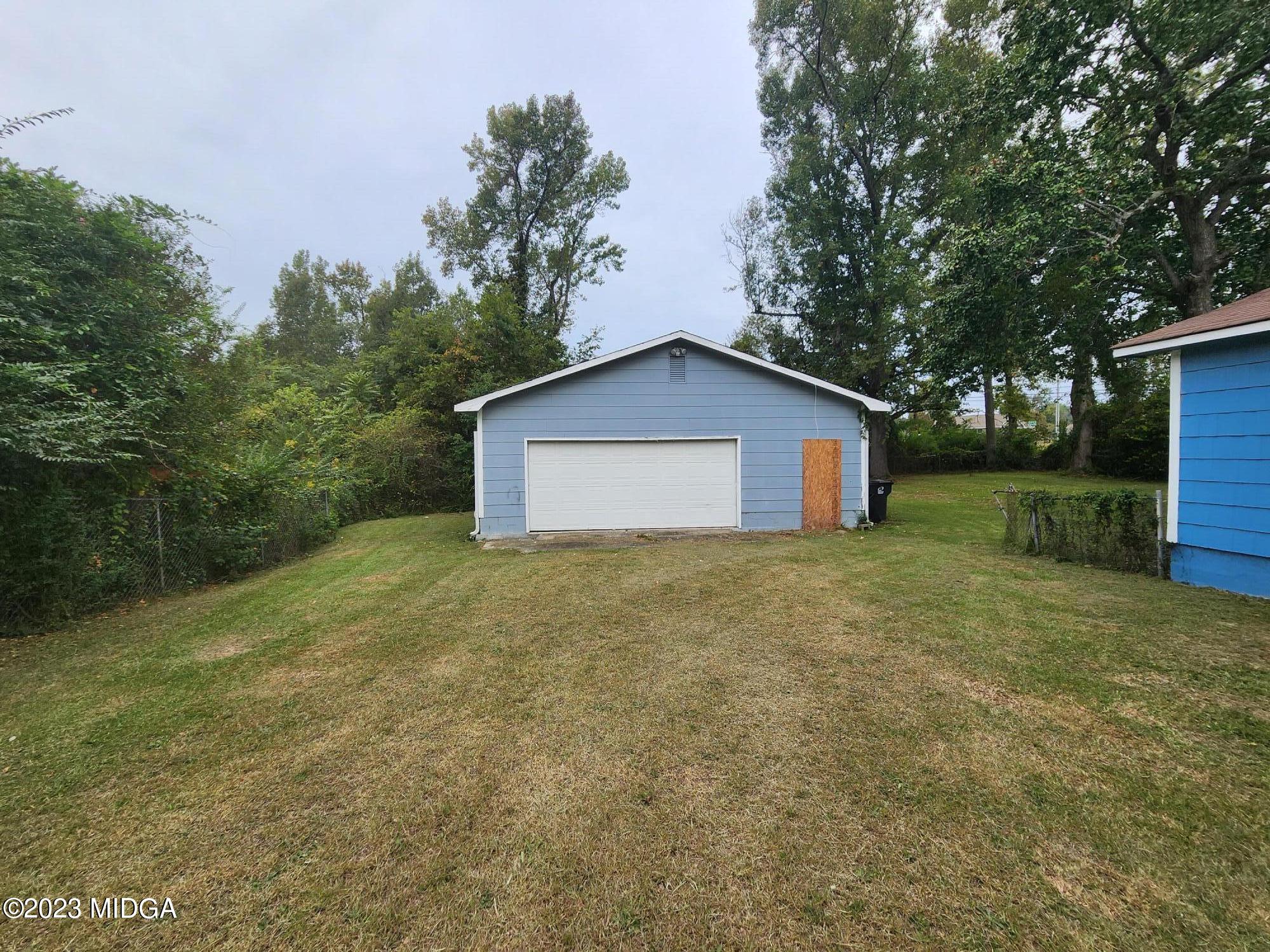 4521 Brookhaven Road Macon, GA 31206 - Photo 7 of 25 a house with trees in the background