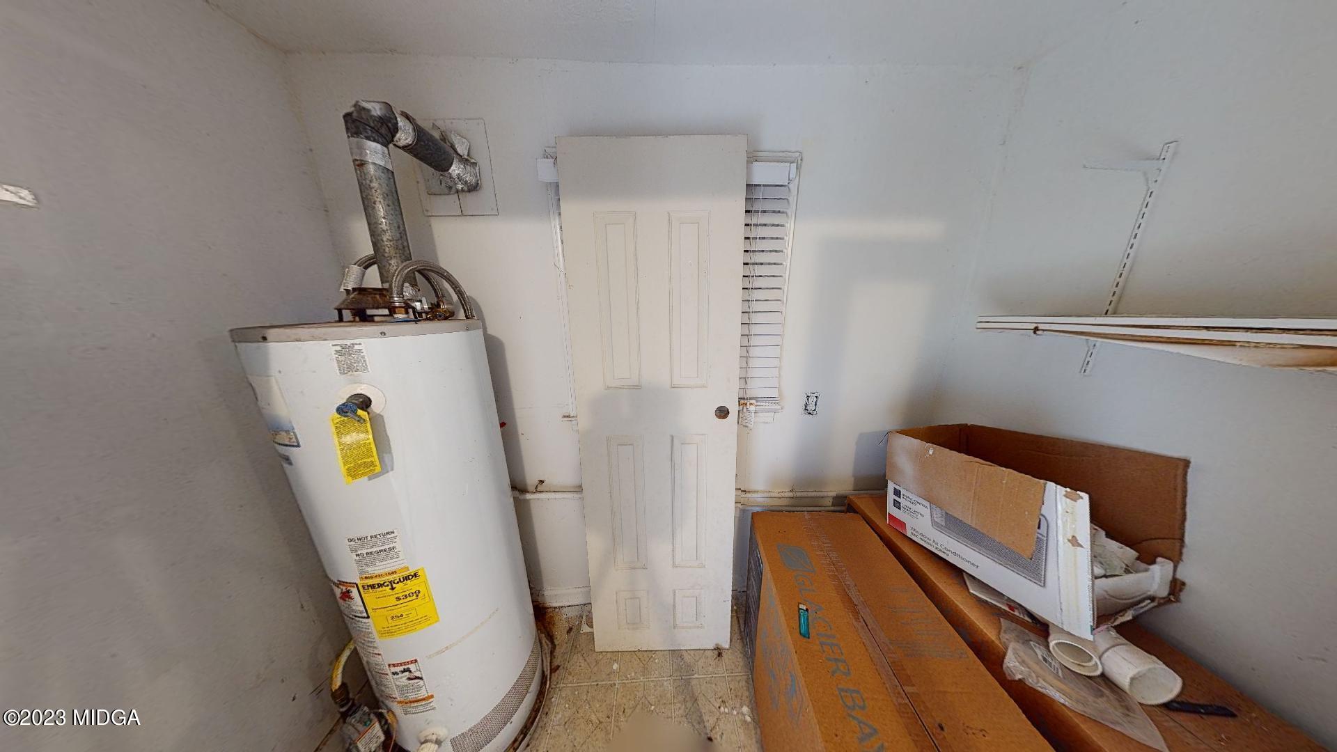 4521 Brookhaven Road Macon, GA 31206 - Photo 10 of 25 walk in closet with wooden floor and windows