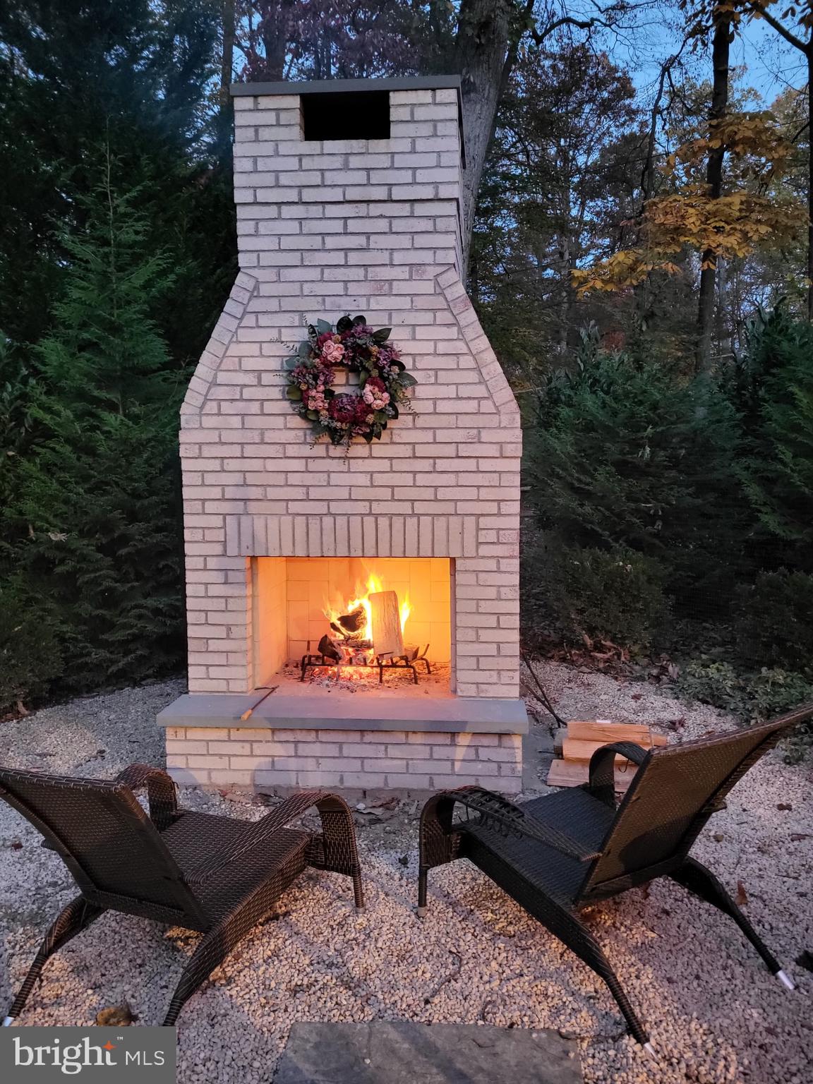 a backyard of a house with seating space