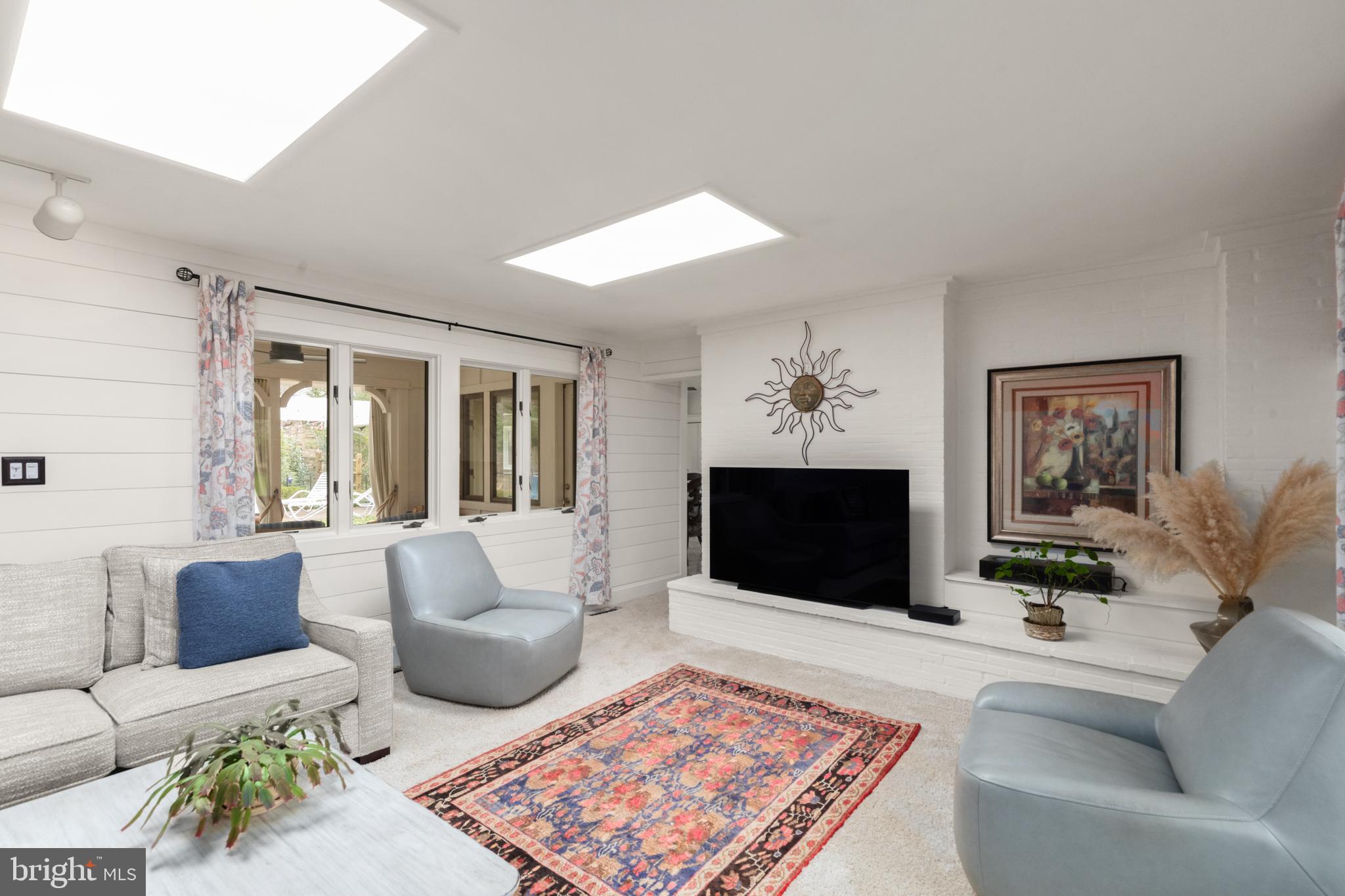 1403 Ellenglen Road Towson, MD 21286 - Photo 13 of 40 a living room with furniture and a flat screen tv