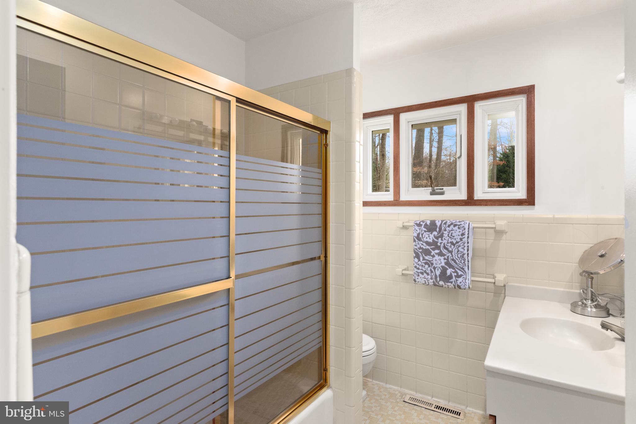 1403 Ellenglen Road Towson, MD 21286 - Photo 25 of 40 a bathroom with a sink and a toilet